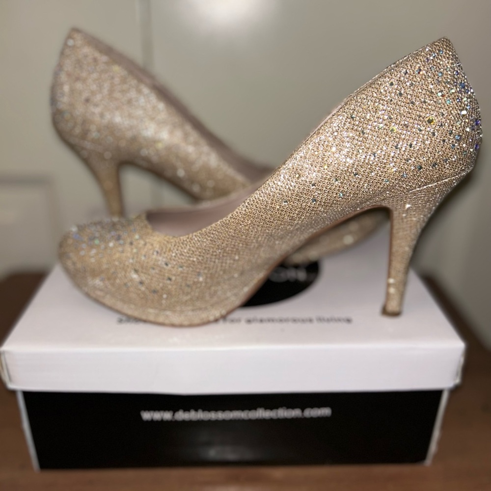 Nude Heels , rhinestones and glitter, gives off a goldfish tint, a medium height